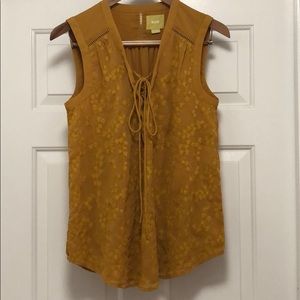 Anthropologie-Maeve floral embroidered lace up top